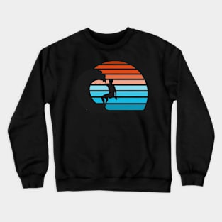 Silhouette of a surfer while surfing during sunset Crewneck Sweatshirt